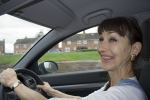 UK_grinning_and_drivng_-_what_a_woman.jpg